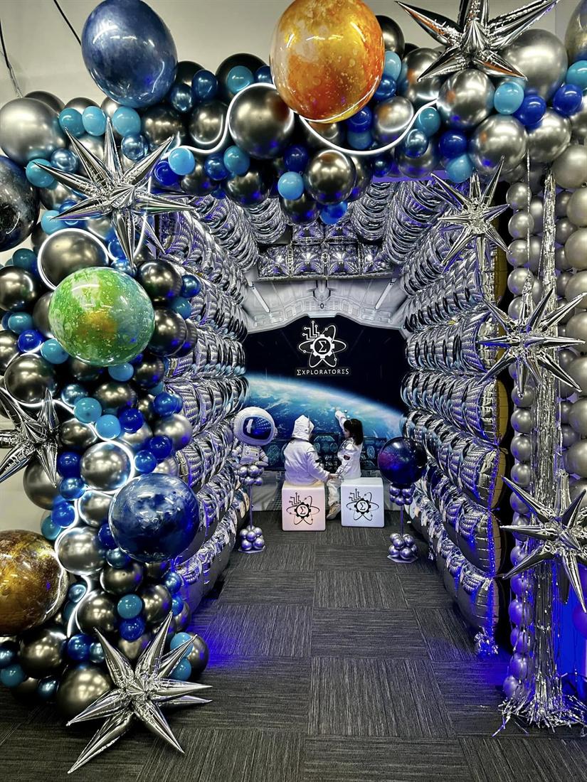 A balloon arch set up for a themed birthday party at Exploratores